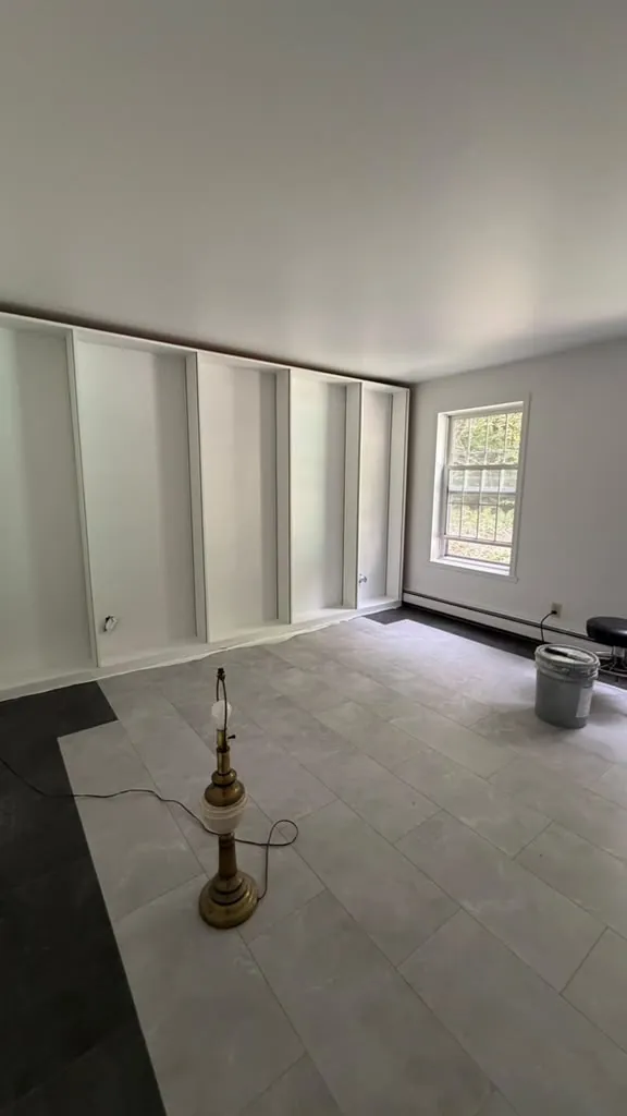 Finished study: built-ins painted white and new flooring